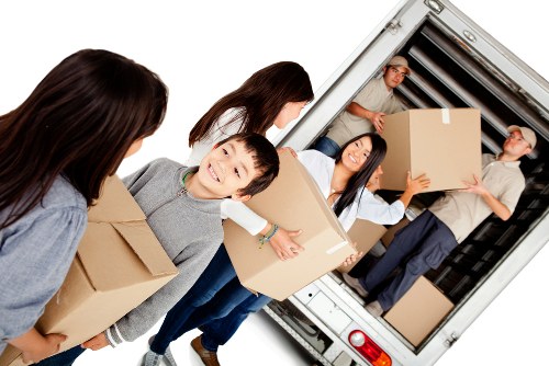 Team preparing safely for a van move with equipment and careful planning