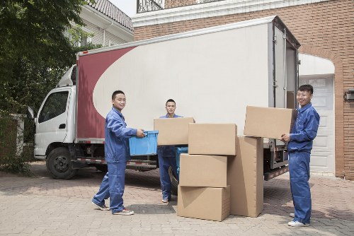 Removal team planning a move on a Hackney residential street