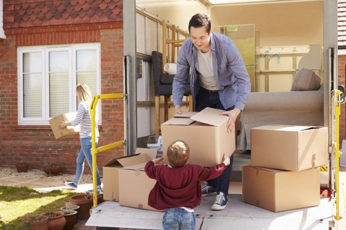 Furniture collection team handling bulky household items in Hackney