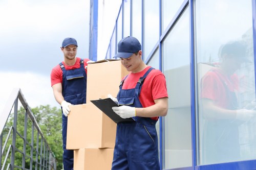 Professional loading of household items into a van in Hackney