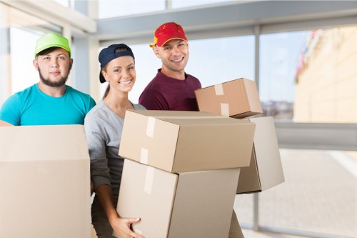 Packed moving boxes and household items prepared for transport in Hackney