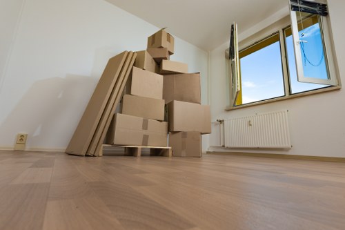 Man with a van loading items in Hackney for a transparent quote-based move