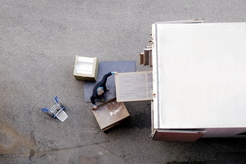 Removal van loading in a busy Hackney street with parking considerations