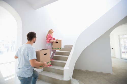 Removal team loading office items from a Hackney premises