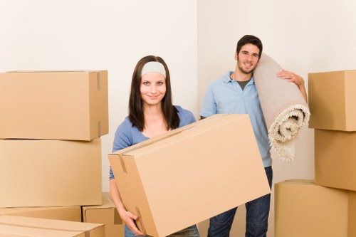 Commercial movers handling desks and equipment during a Hackney office relocation