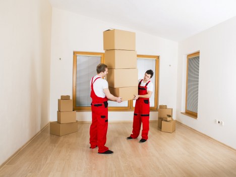 Packed boxes and furniture ready for a house move in Hackney